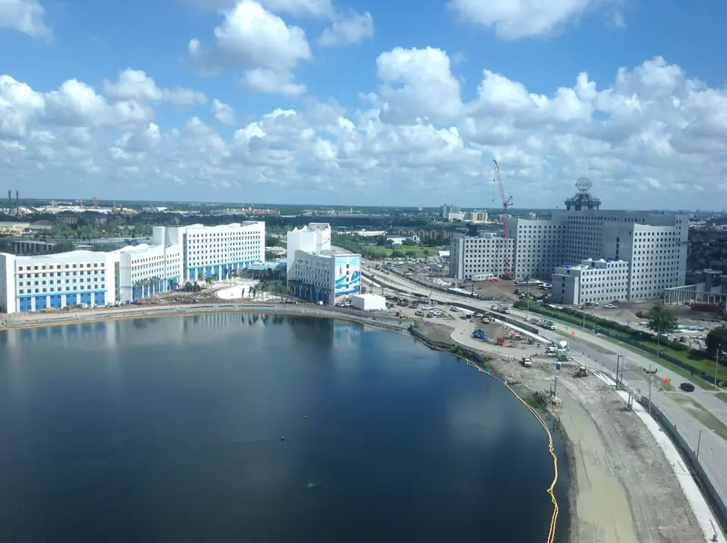Hotels under construction in Orlando, Florida, viewed across a lake